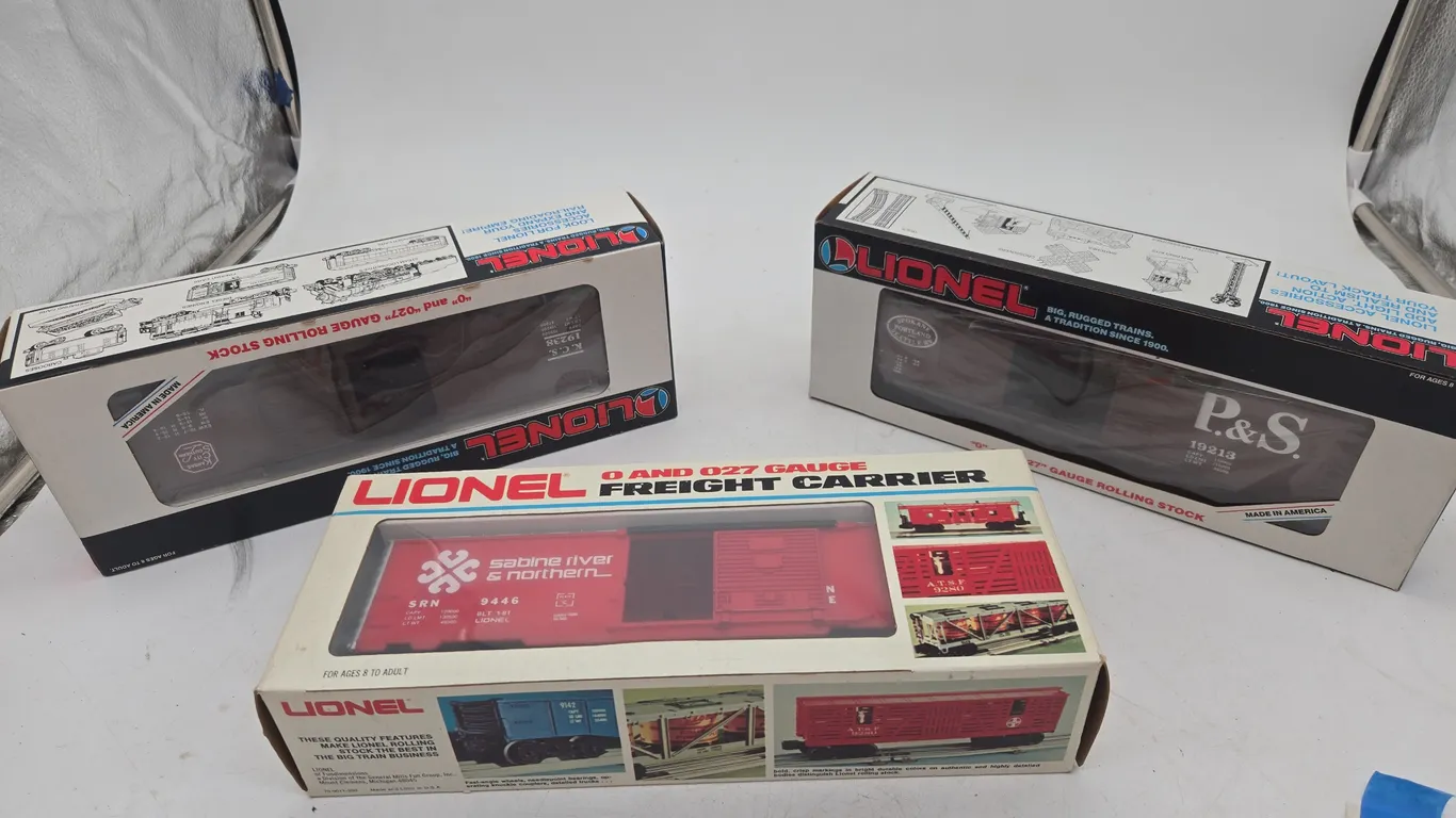 Assorted lionel train cars new inboxes