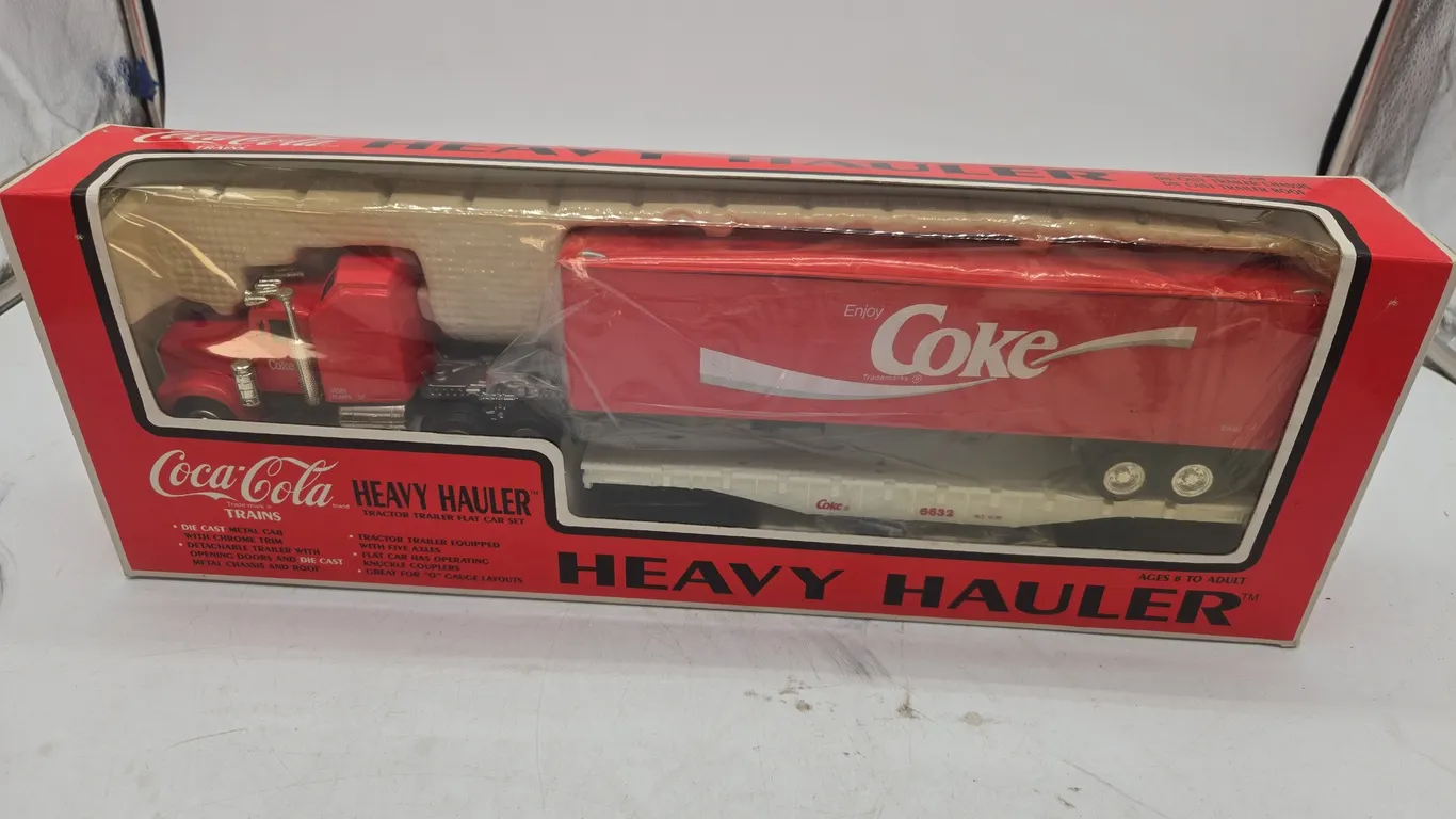 Vintage Coca-Cola, trains heavy Hauler, semi and flat car combination, new inbox.