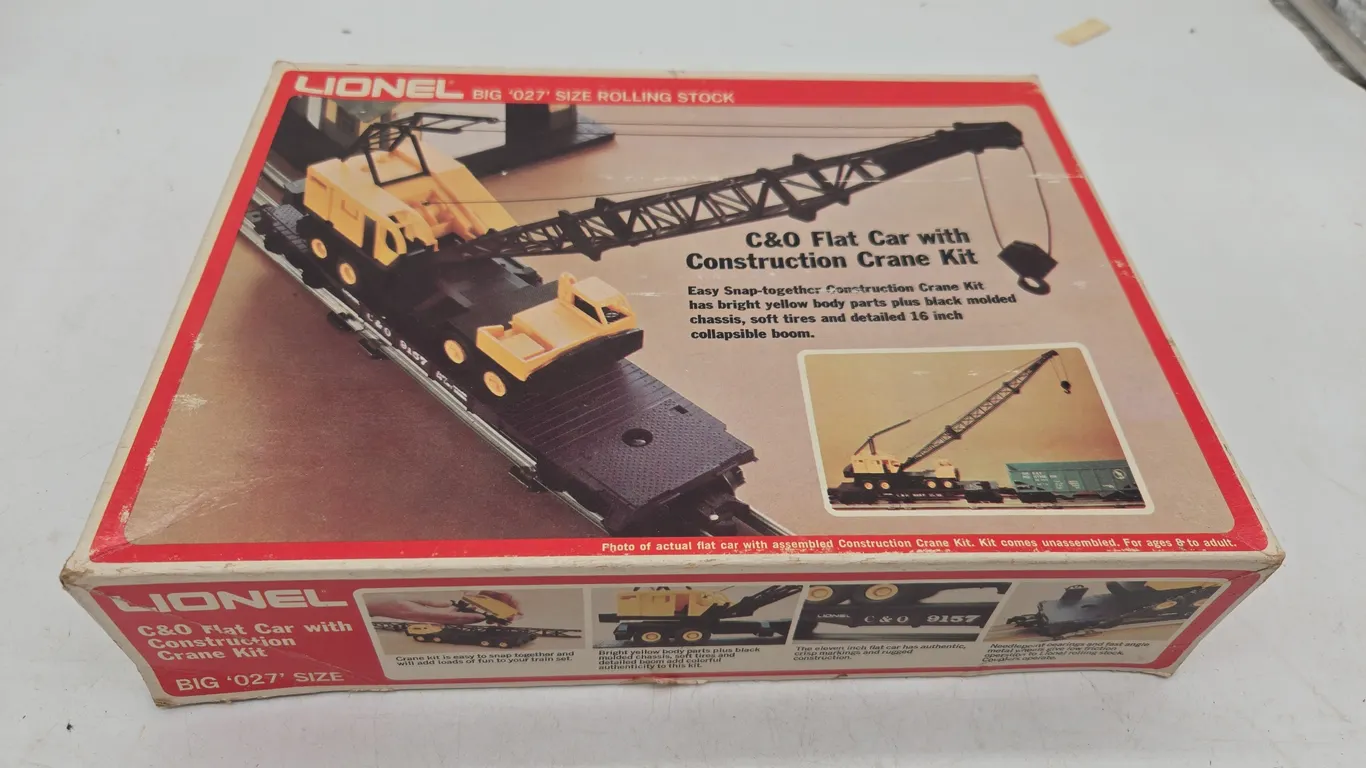 The vintage Lionel C&O flat car with construction Crane kits, original box.