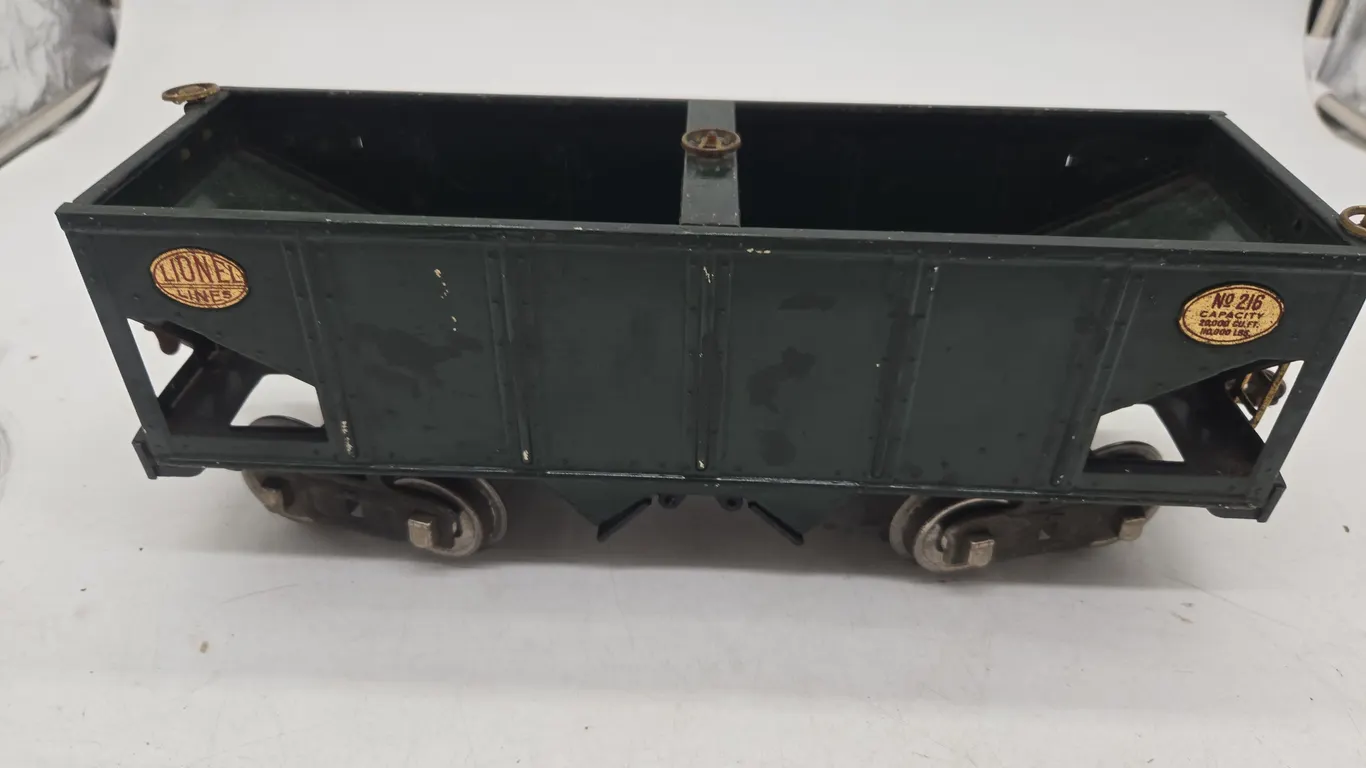 Vintage lionel number 216, 4 wheeled dark green hopper car