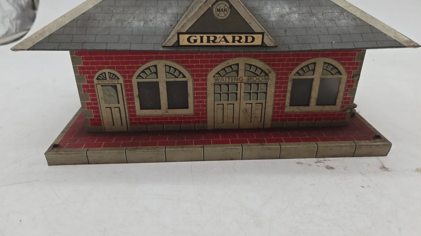Vintage marxs toys, whistling train station.Number 2959