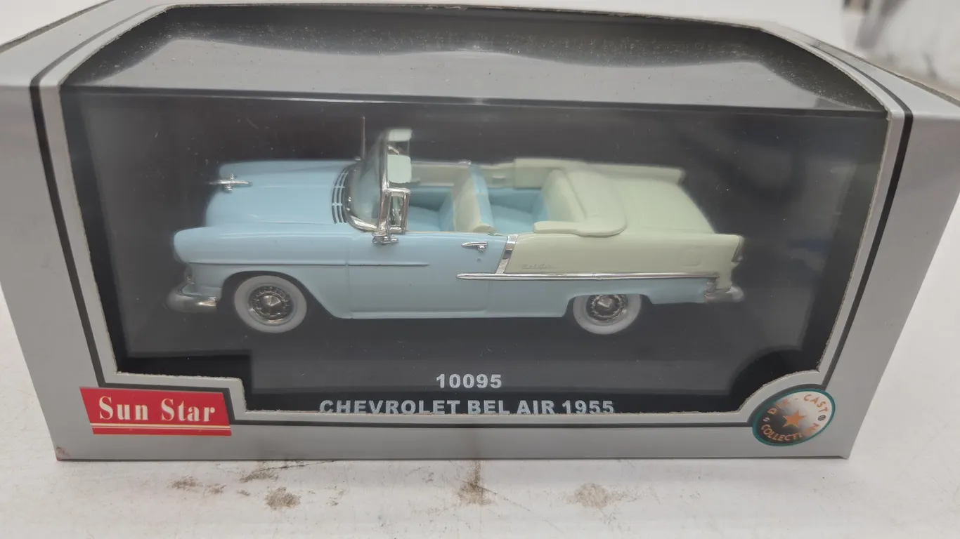 Vintage sunstar, 1955 Chevy, Belair, convertible. Diecast, car new inbox.