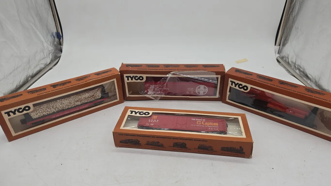 Assorted h o size train cars, new inboxes