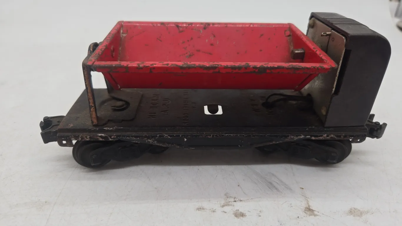 Vintage lionel number 4981 little stinky lines coal dump car.