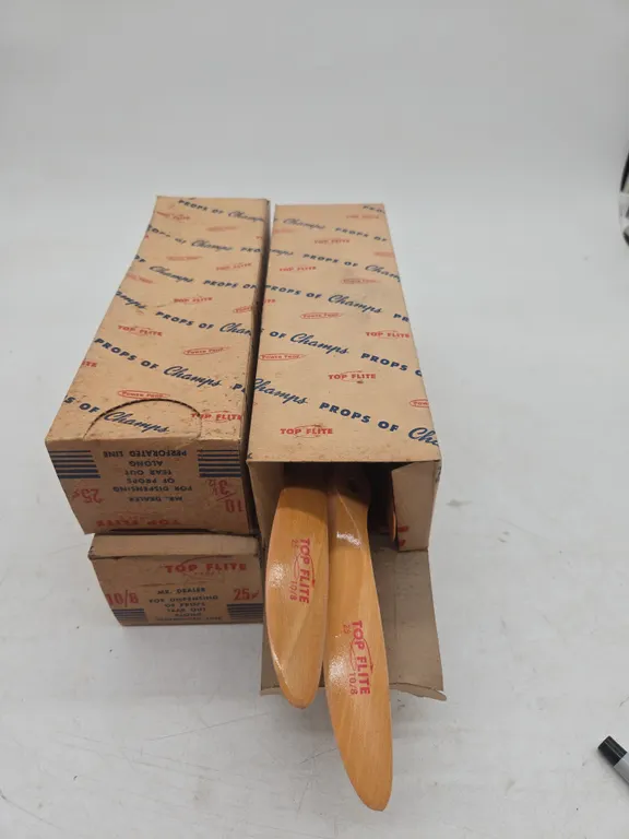 Vintage power props, props of champions, airplane props new in package.