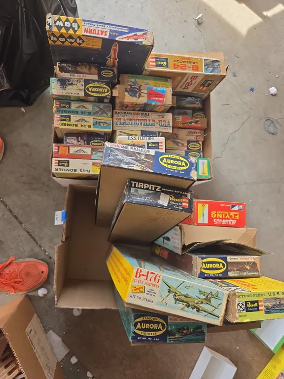 Box full of empty vintage model boxes