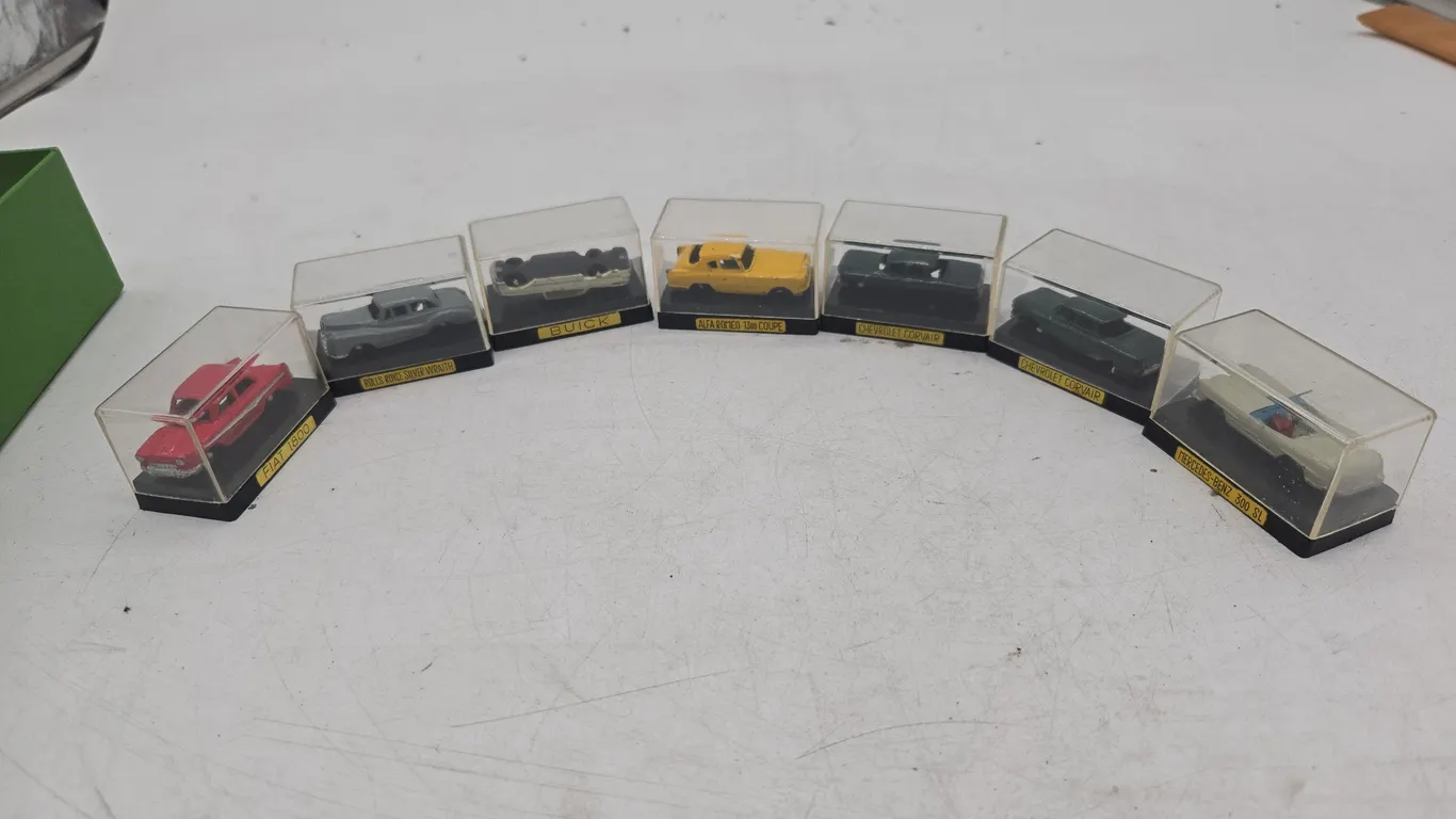 Assorted vintage, a h I brand made in japan. HO scale diecast cars
