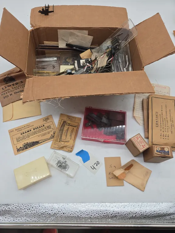 Assorted train repair pieces and parts