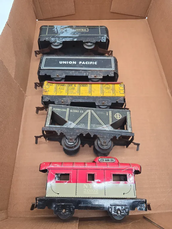 Assorted tin lithograph, train cars.