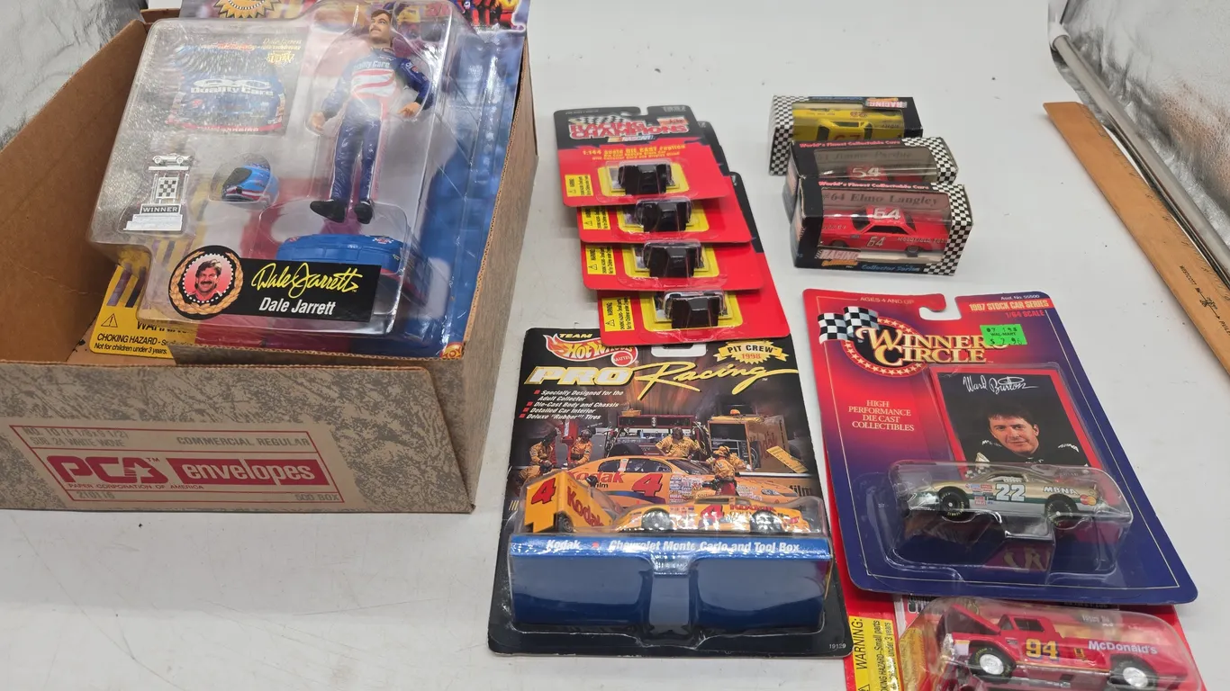 Assortment of die cast collectors cars, new in packages