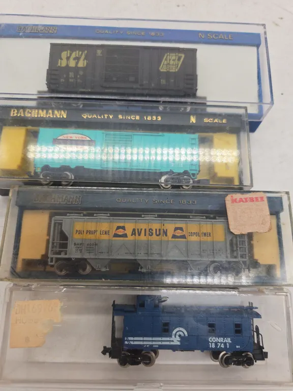 Assorted in scale train cars, new inboxes