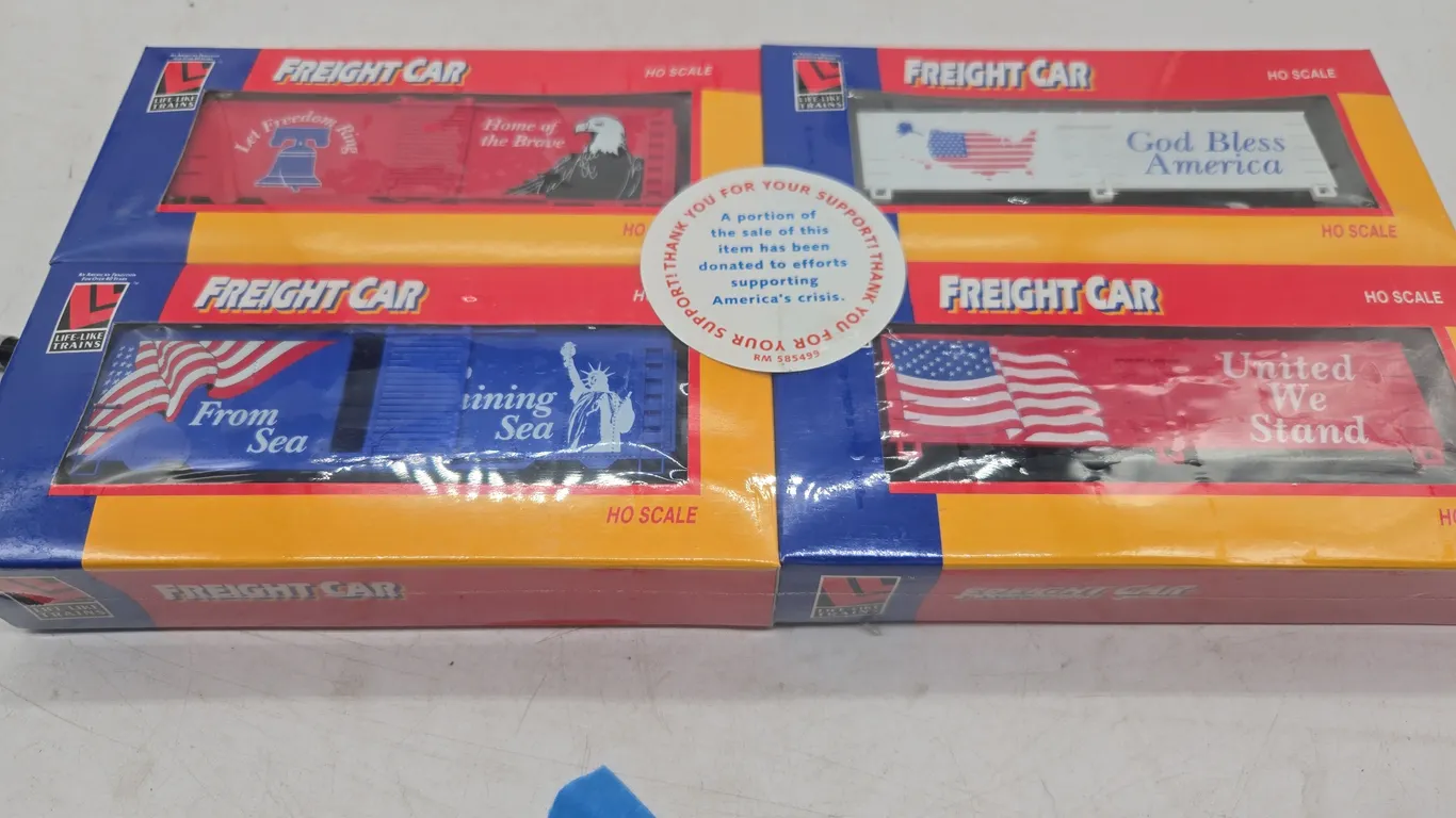 Vintage lifelike trains, American commemorative box car 4 pack set new in boxes.