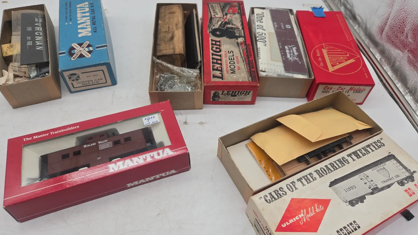 Assorted vintage h* scale train cars, new in boxes.