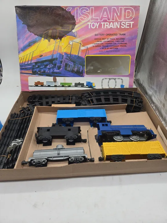 Vintage rock island train set in original box.