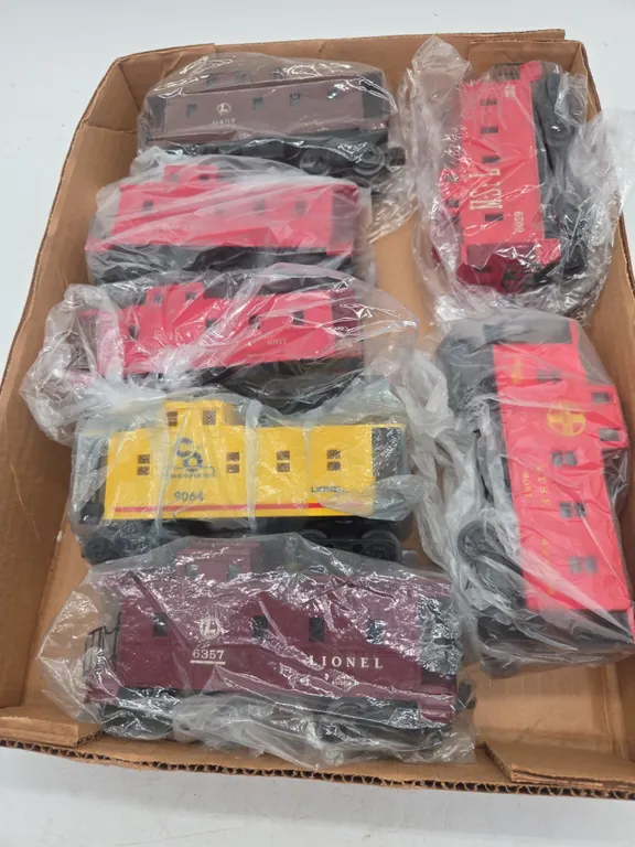 Assorted standard gauge, train cars, all cabooses.