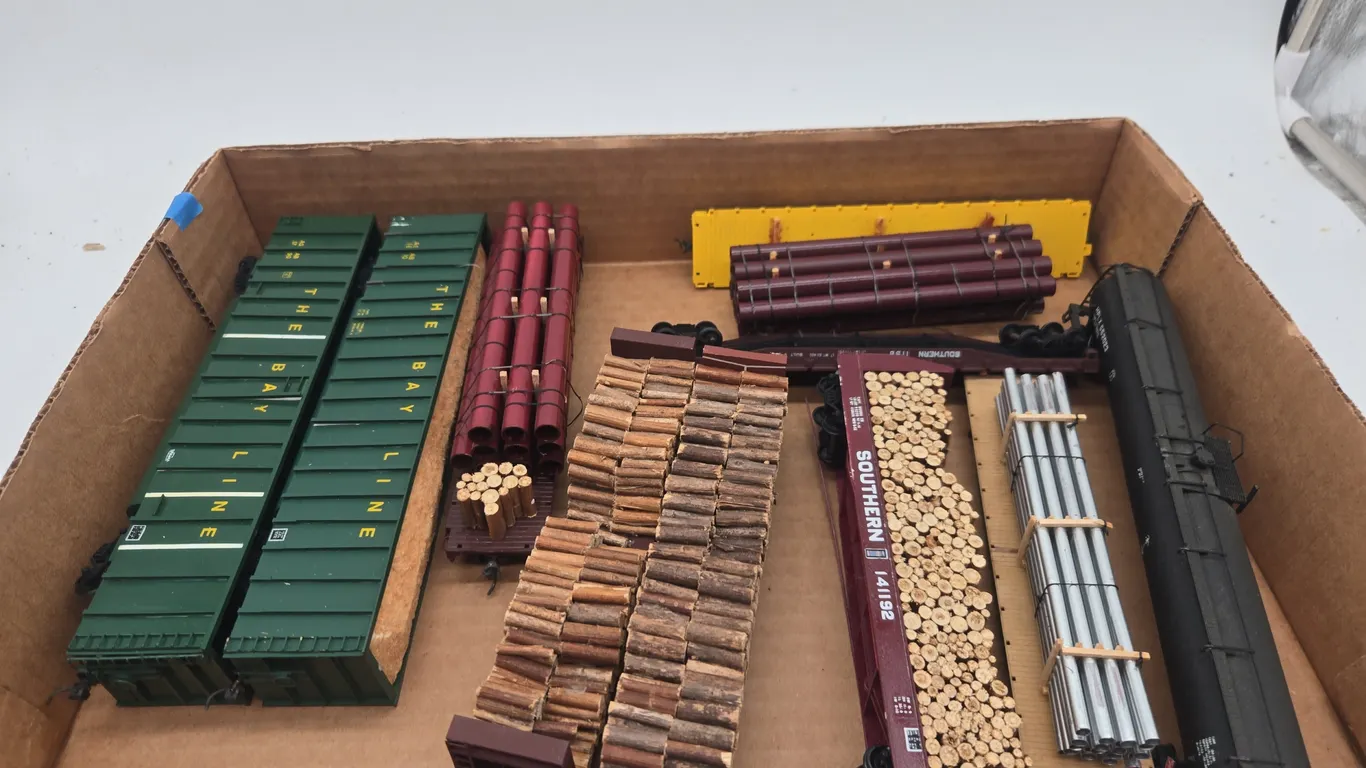 Assorted vintage h* scale train cars.