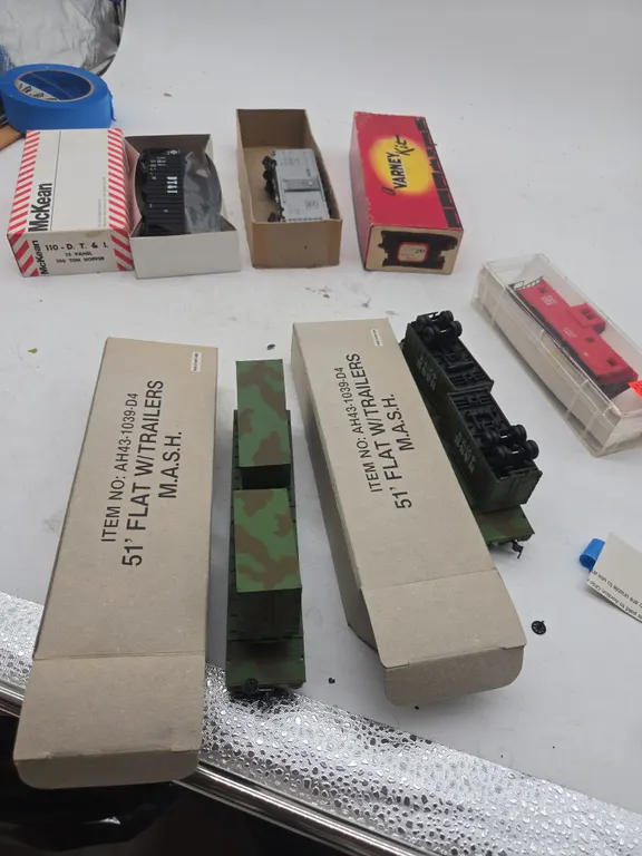Assorted vintage h o scale, train cars, new inboxes
