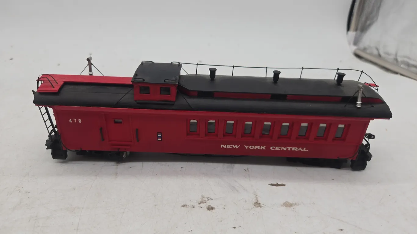 The vintage wooden, new york central number 470 combination caboose and passenger car