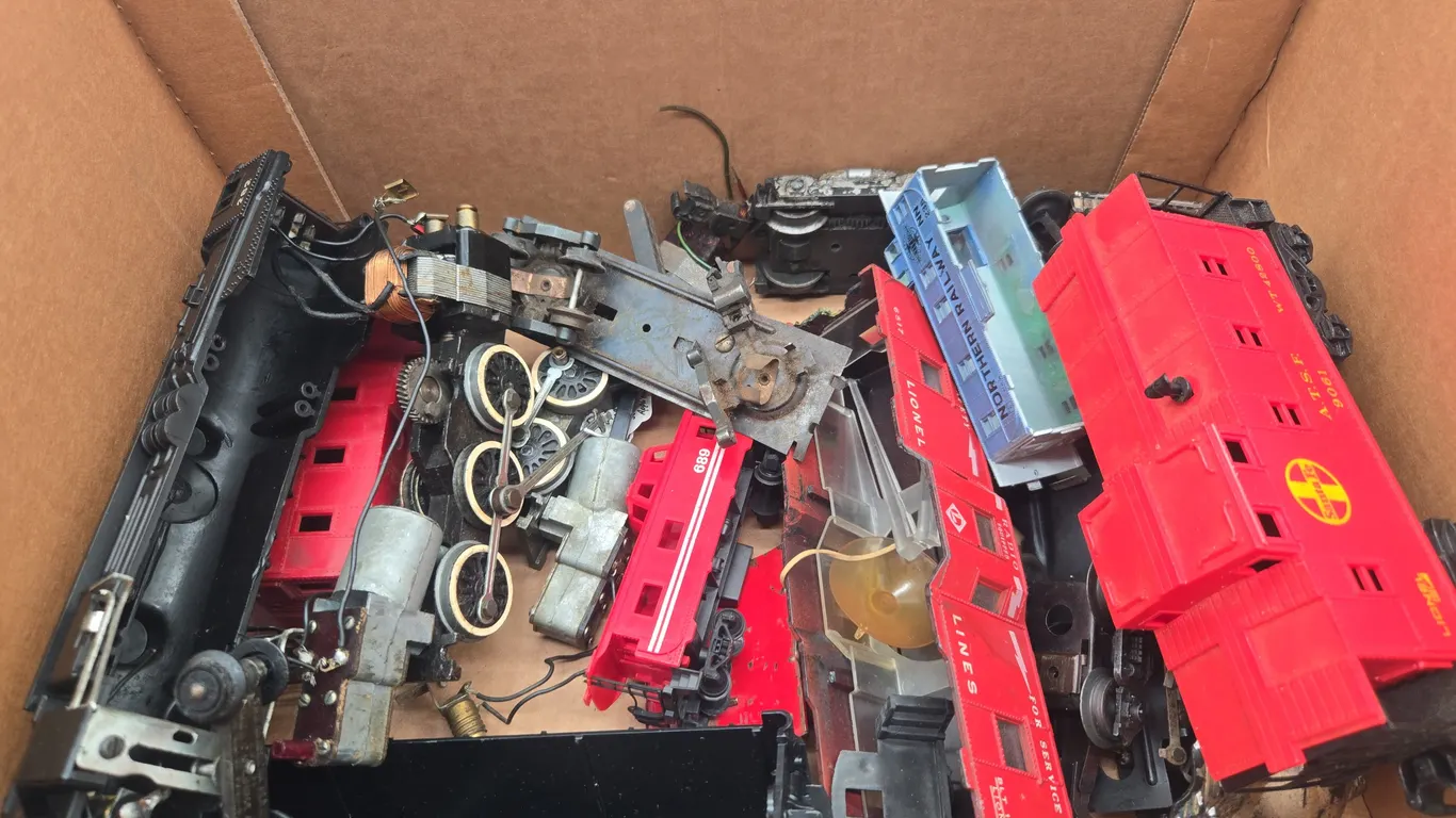 Assorted train pieces and parts
