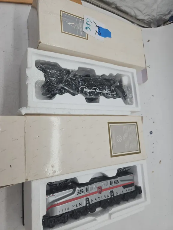 Vintage avon train collectors bottles, new inboxes