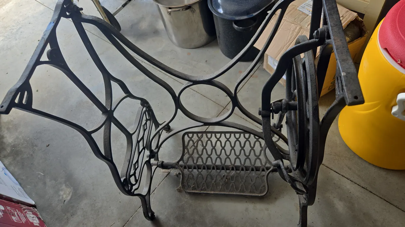 Antique sewing machine cast iron treadle base