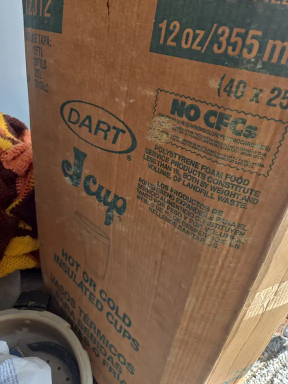 Box full of styrofoam cups