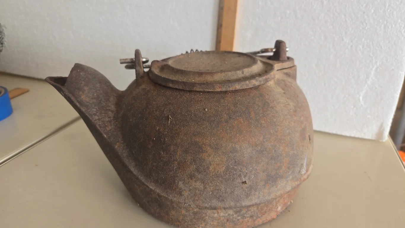 Vintage cast iron kettle