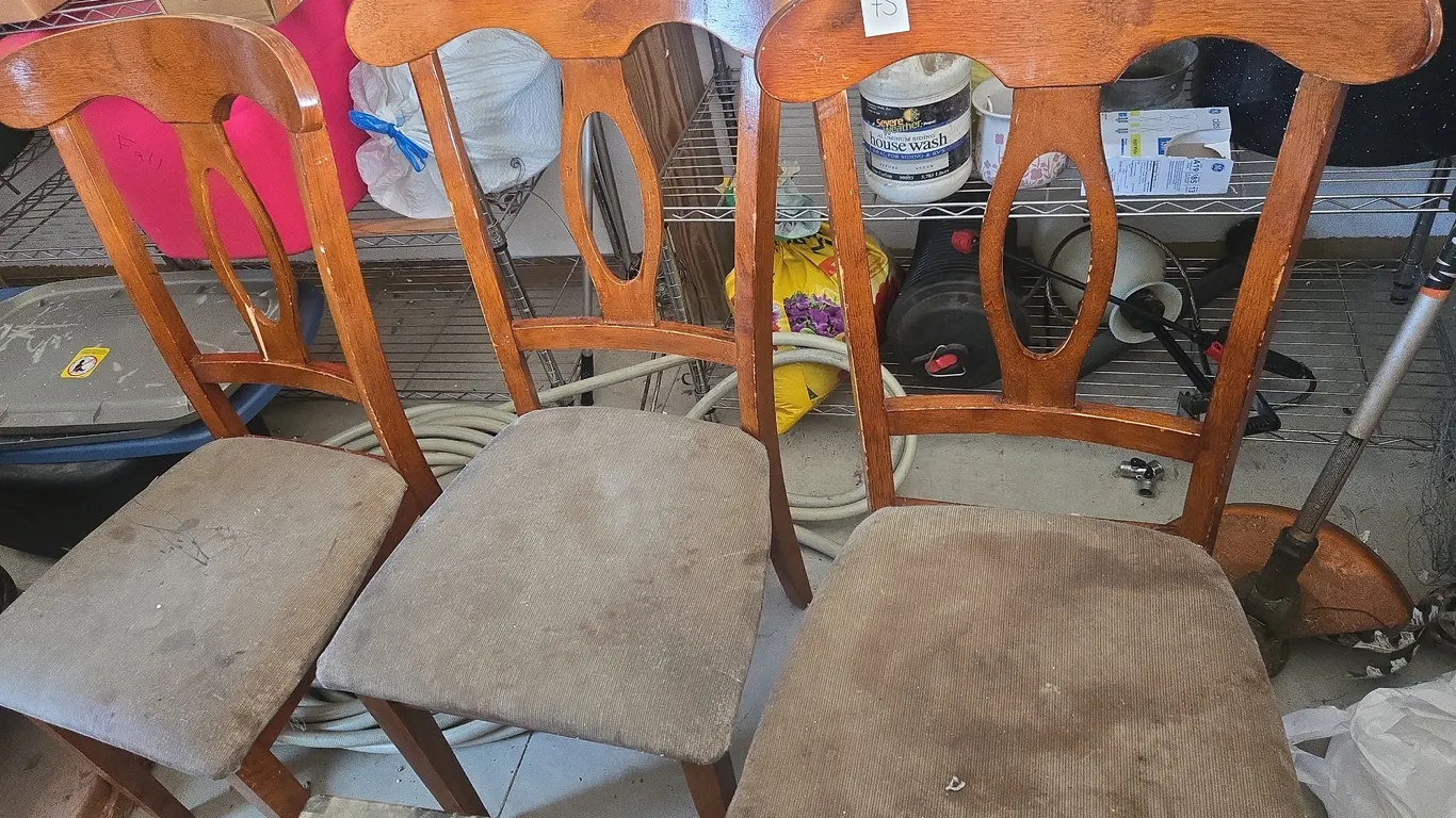 3 wooden high backed cusioned chairs