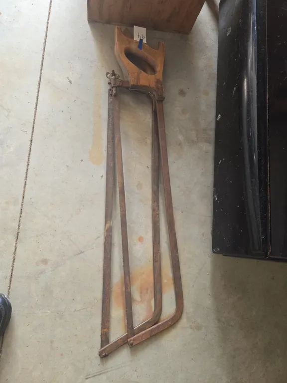 Pair of vintage meat cutting saws