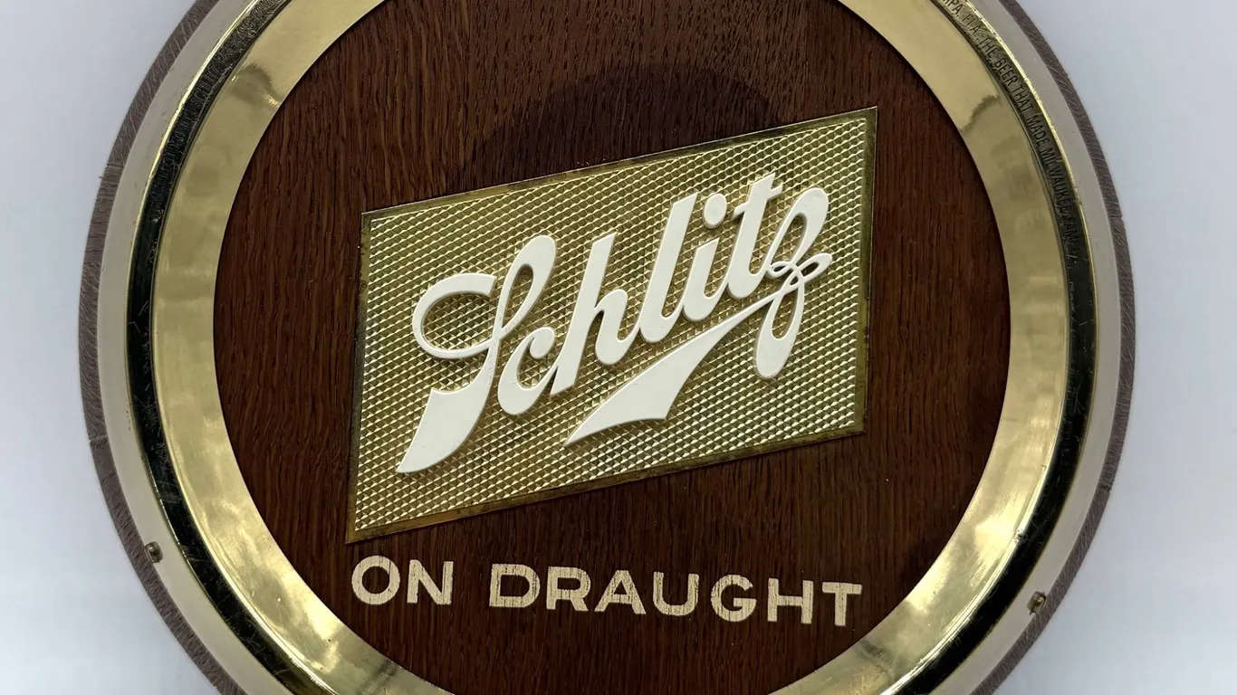 Schlitz On Draught Beer Sign with Brass Trim