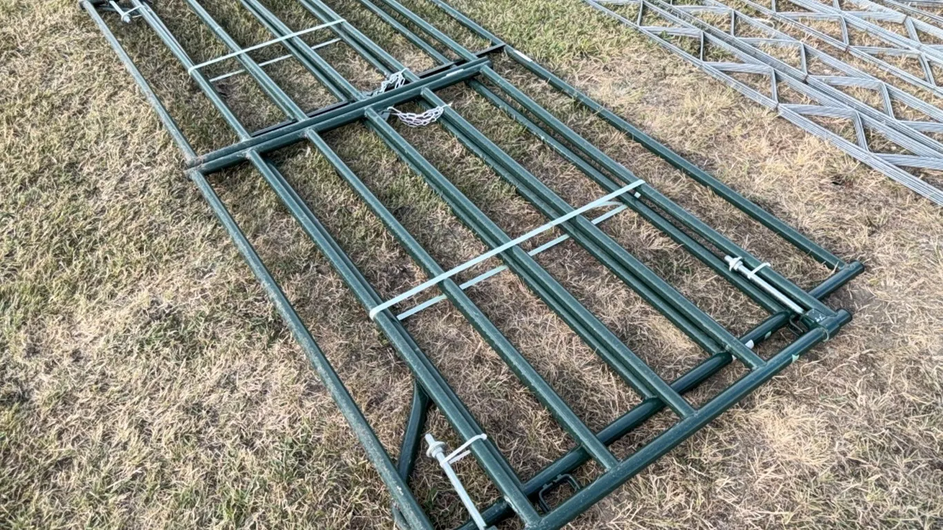 1) New Behlen 12' split corral gate & 1) solid 12' corral panel -Sales Tax