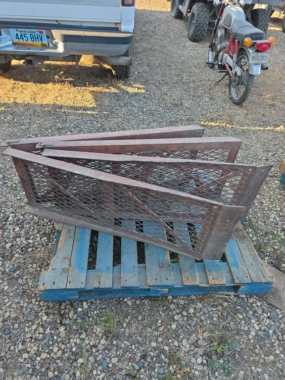 Pair of folding steel loading ramps