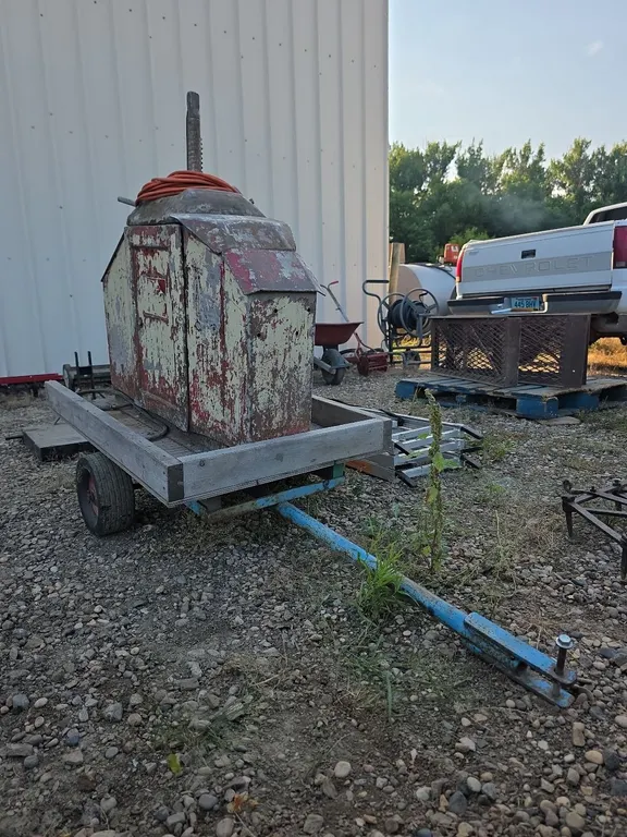 Tire changer on pull behind cart