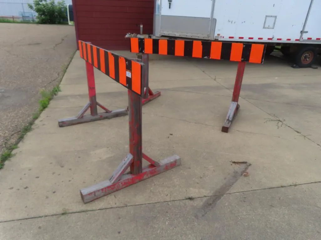 Lot - (2) Orange and Black Barricades, Approx. (14) White Barricades *Located at 4831 93 Ave, Edm.