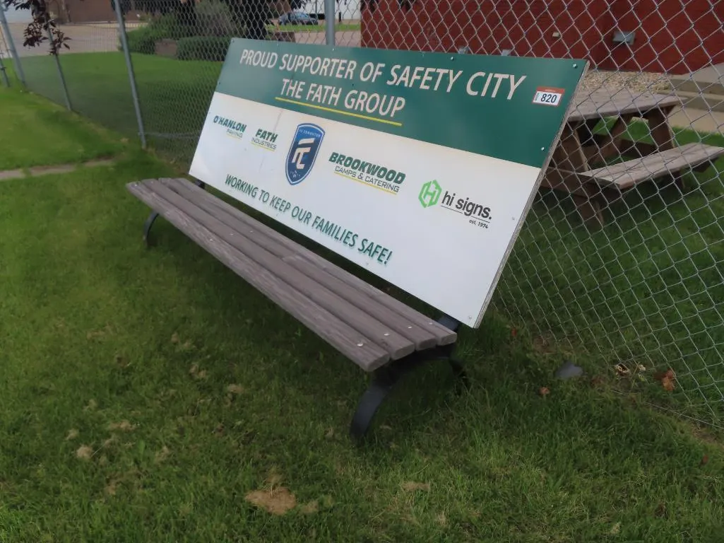 Bench with Advertising Sign as the back *Located at 4831 93 Ave, Edm.