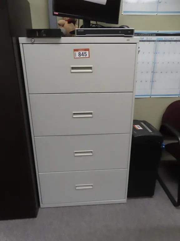 Grey 4 Drawer Lateral Filing Cabinet *Located at 4831 93 Ave, Edm.