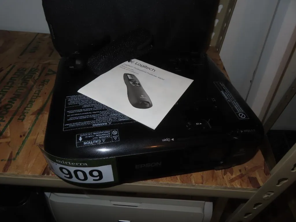 Lot - Epson LCD WUXGA Projector, Logitech Professional Presenter R800 and Projector Screen *Located at 4831 93 Ave, Edm.