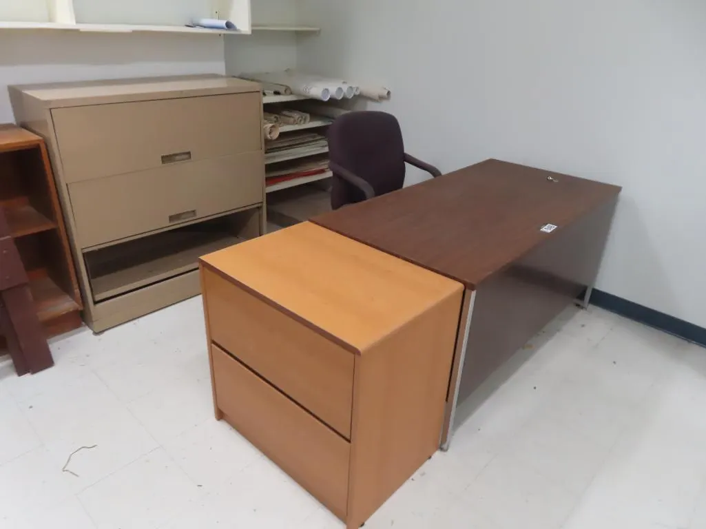 Lot - Blonde 2 Drawer Lateral Filing Cabinet, Brown Wood/Metal Desk, Office Chair, Beige 3 Drawer Lateral Filing Cabinet, Shelf *Located at 4831 93 Av