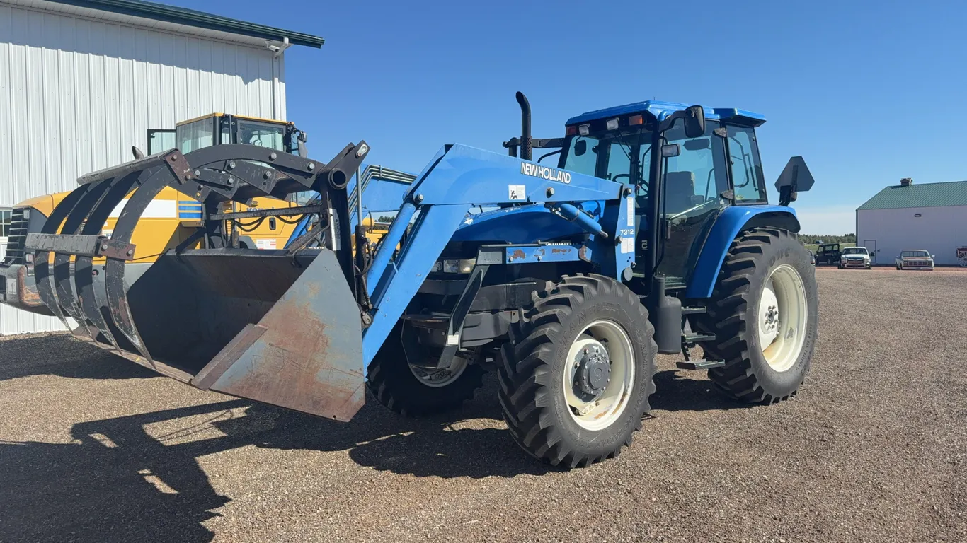 New Holland TM125 Tractor with Loader
