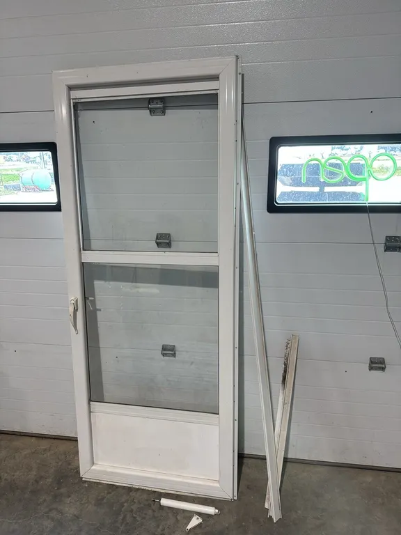 Storm door 32”x79”