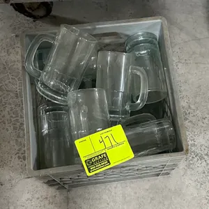 Crate of glass beer mugs. Features clear glass construction with integrated handles. Includes plastic storage crate.