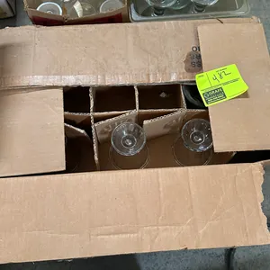 Box of assorted glassware. Includes clear stemmed glassware packed in a partitioned cardboard carton.