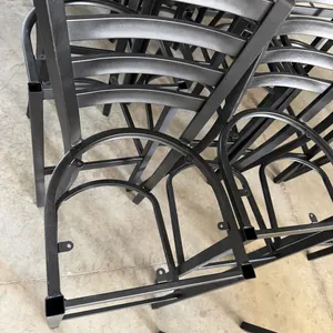 Metal high-top barstool chair frames. Features black finish, curved slat backs, integrated footrests, and pre-drilled seat mounting tabs. Note: Seat c