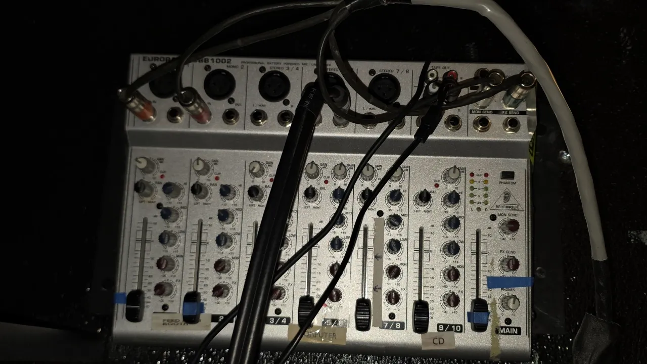 Behringer Eurorack UBB1002 audio mixer and Arion Corporation 935L power control unit. Includes Behringer 10-channel mixer, Arion 935L power control bo