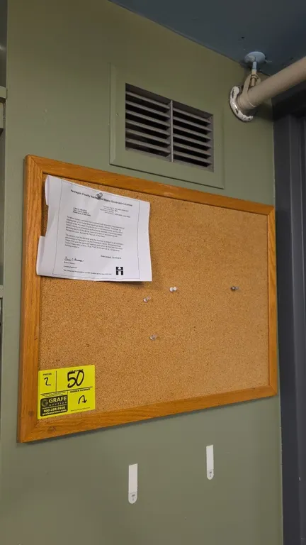 Cork bulletin boards. Features natural cork surface and light wood frames. 2' x 3'. Wall mount design.