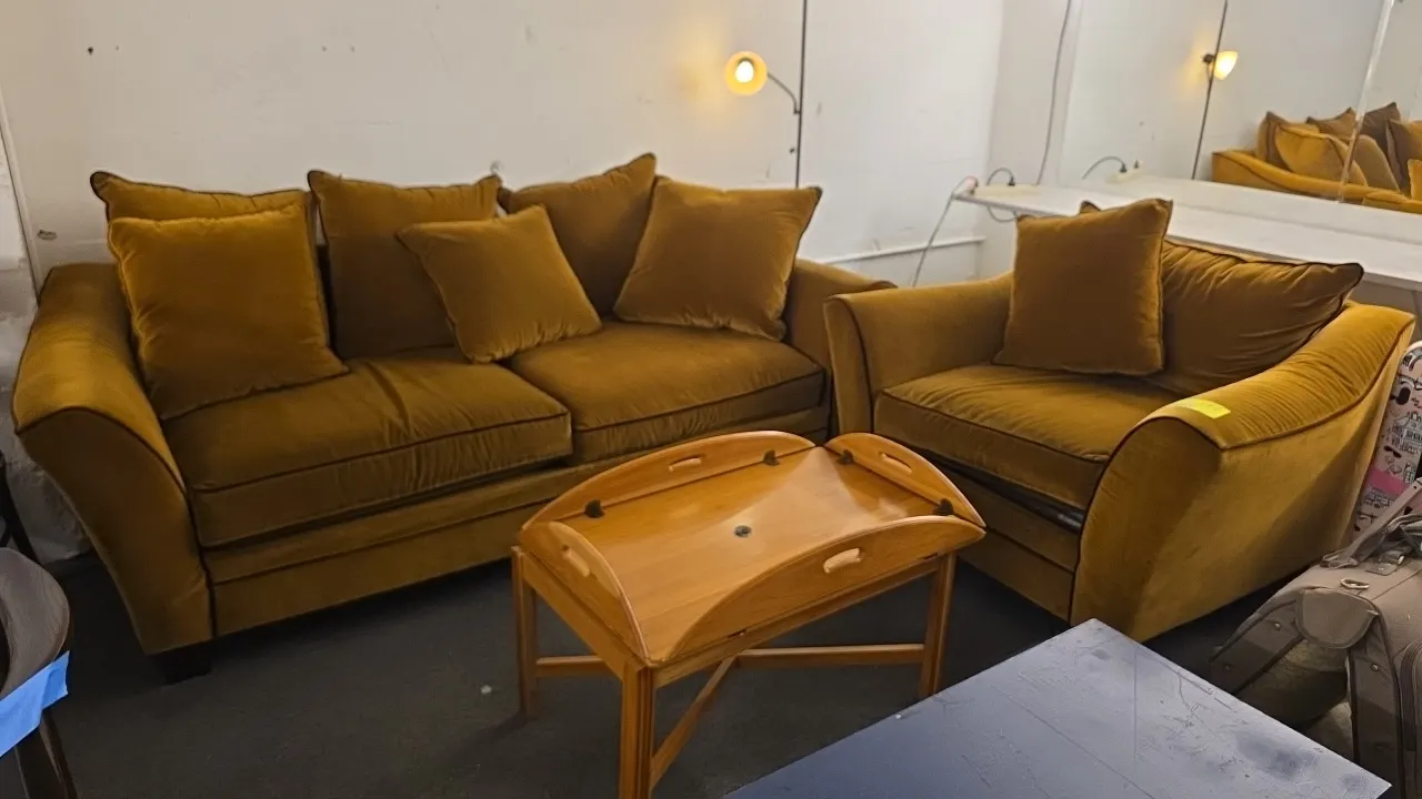 Upholstered seating set. Includes 90"L x 43"D sofa/loveseat and 48"L x 43"D armchair. Features mustard gold velvet-style upholstery, contrasting pipin