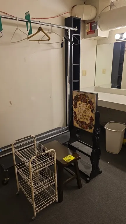 Assorted furniture and decor items. Includes a 3-tier metal wire rolling cart on casters, a wooden step stool, a decorative wooden ABC needlepoint sam