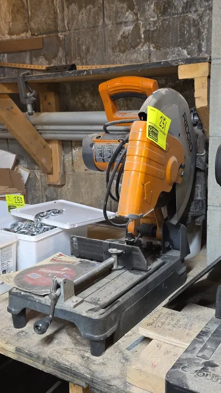Ridgid 14" chop saw. Features an integrated quick-locking material vise clamp, top carrying handle, and blade guard. Includes additional Diablo metal