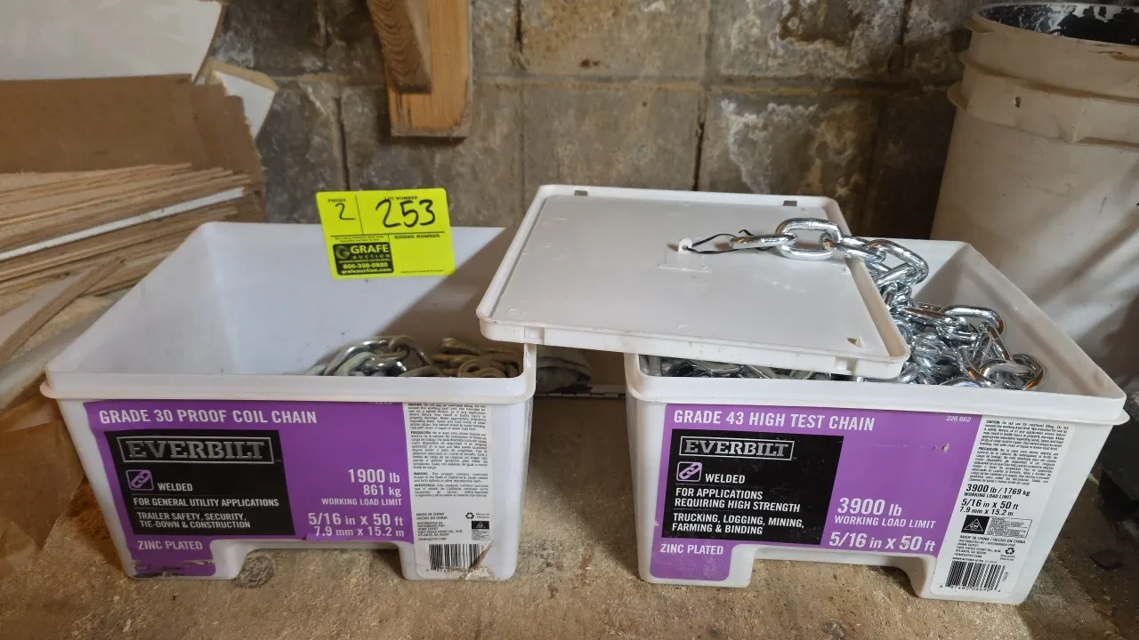 Everbilt welded steel chains in plastic storage bins. Includes (1) Grade 30 proof coil chain (5/16" x 50'L, 1,900 lb working load limit) and (1) Grade