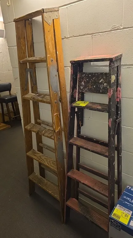 Wood stepladders. Includes (1) 5'H and (1) 6'H wood folding stepladder. Features solid wood construction with folding spreader brackets.